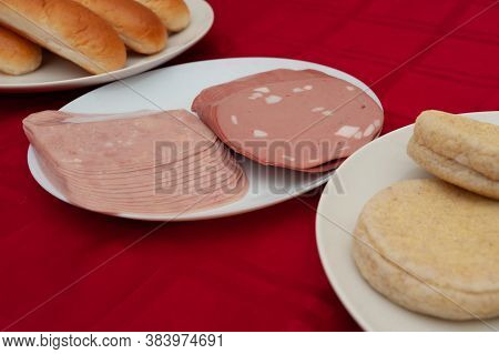 Breakfast With Mortadella, Ham, Whole Grain Bread And 