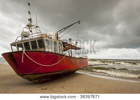 Fishing Boast On The Beach.