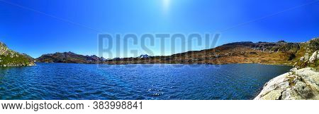 Panorama Scenery Of The Swiss Alps. Lake At The Top Of Grimsel P