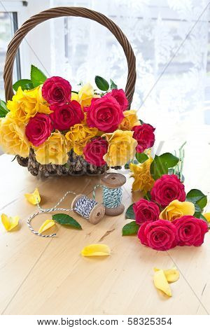 Colorful Roses In A Vintage Basket