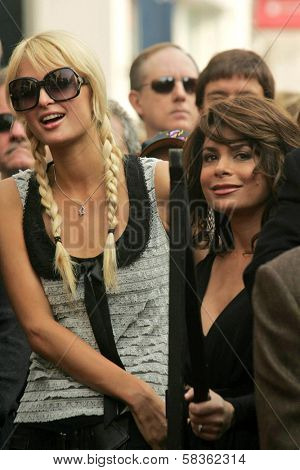 Paris Hilton and Paula Abdul at the Ceremony Honoring Los Angeles Lakers Owner Jerry Buss with the 2,323rd star on the Hollywood Walk of Fame. Hollywood Boulevard, Hollywood, CA. 10-30-06