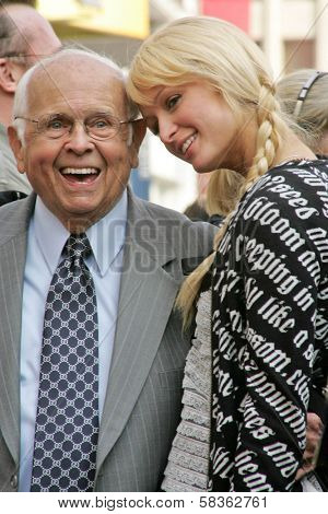 Johnny Grant and Paris Hilton at the Ceremony Honoring Los Angeles Lakers Owner Jerry Buss with the 2,323rd star on the Hollywood Walk of Fame. Hollywood Boulevard, Hollywood, CA. 10-30-06