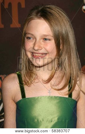 Dakota Fanning at the CMT Giants honoring Reba McEntire. Kodak Theatre, Hollywood, CA. 10-26-06