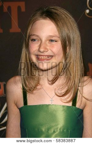 Dakota Fanning at the CMT Giants honoring Reba McEntire. Kodak Theatre, Hollywood, CA. 10-26-06