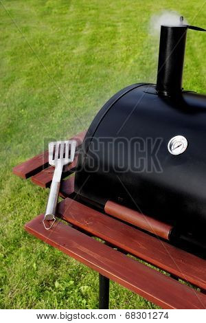 Bbq Grill On The Lawn