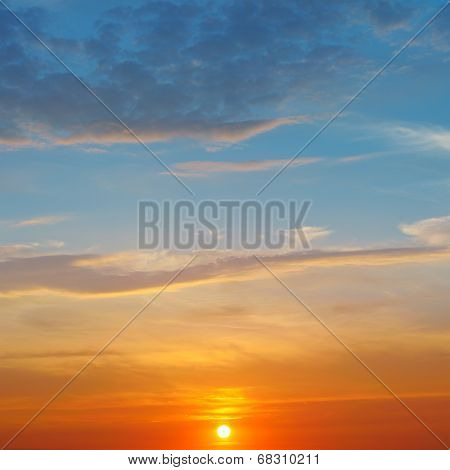The Sun Rays Illuminate The Sky Above The Horizon