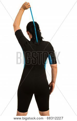 Surfer Closing Zipper To Neoprene Suit