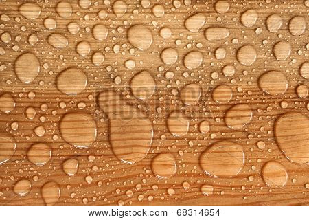 water drop on a wooden background
