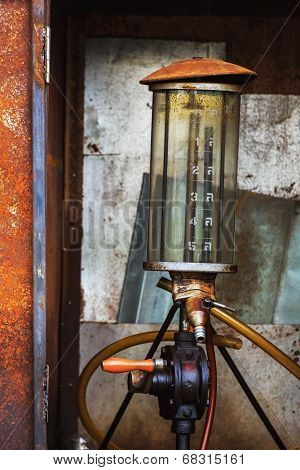 The Drum Of Fuel And Hand Pump In Old Gasoline Station