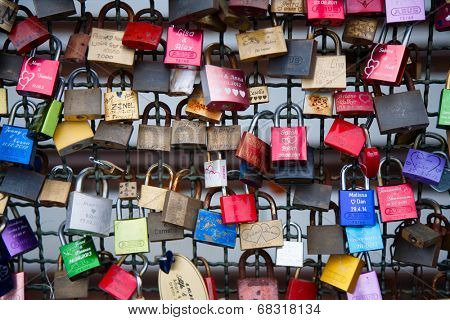 COLOGNE, GERMANY - MAY 29, 2014, Thousands of love locks which sweethearts lock to the Hohenzollern Bridge to symbolize their love on May 29 in Koln, Germany 