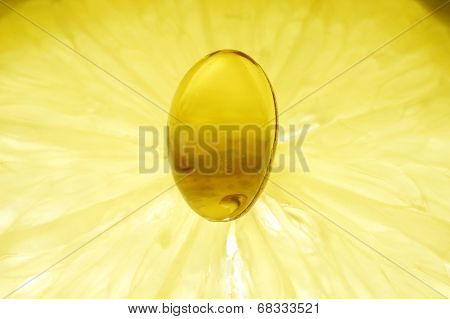 lemon and pill of vitamin c - concept