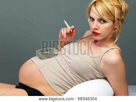 Pretty Pregnant With A Cigarette