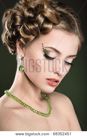 Beautiful girl with perfect skin and bright makeup.