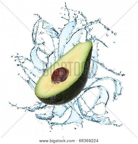Fresh avocado with water splash over white background