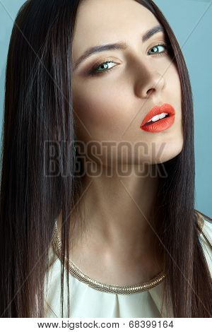 Beautiful young woman with long straight hair