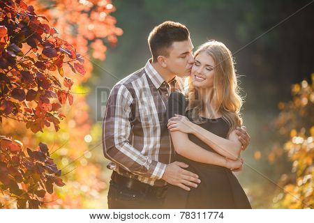 Autumn portrait of a loving couple.