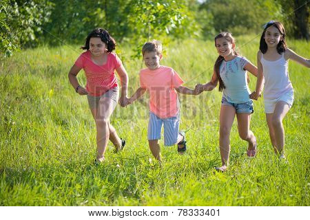 Group Of Happy Children Playing