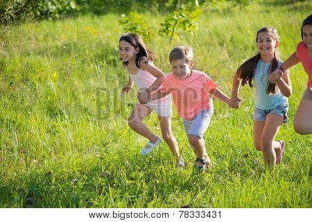 Group Of Happy Children Playing