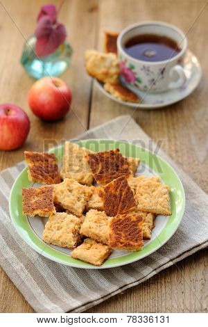 Black Tea In A Cup With Cookies And Apples