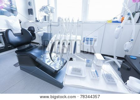 Dentist's Chair With Tools And Drills