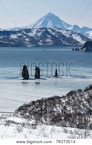 Three Brothers Rocks In Avachinskaya Bay And Viluchinsky Volcano (kamchatka Peninsula)