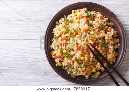 Fried Rice With Eggs, Corn And Parsley Close-up Horizontal Top View