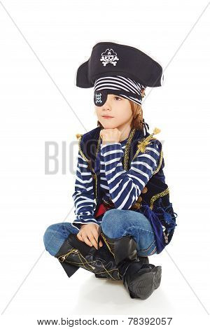 Grinning little boy pirate