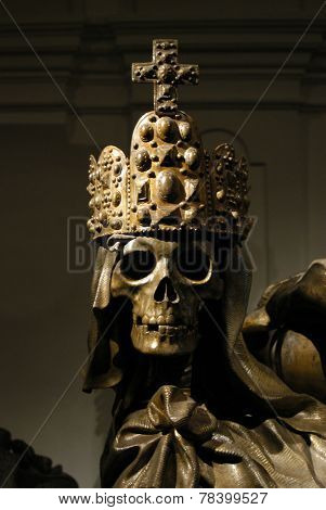 Crowned skeleton in the ancient emperor tombs Kaisergruft in Vienna, Austria.                