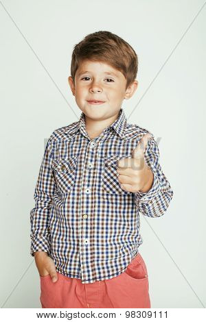little cute boy on white background gesture