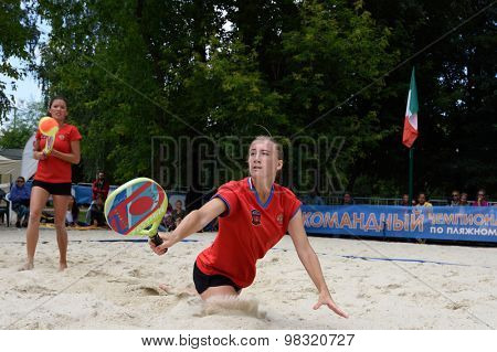 MOSCOW, RUSSIA - JULY 18, 2015: Irina Glimakova (center) and Julia Chubarova of Russia in the semifinal match of the Beach Tennis World Team Championship against Brazil. Russia won the match 2-1