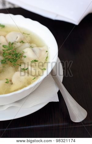 Broth with dumplings.