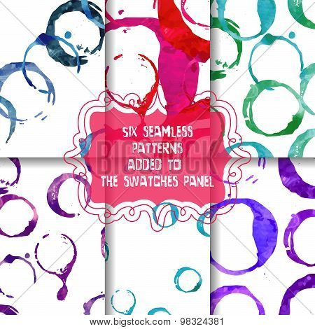 Set of seamless patterns with watercolor stains.