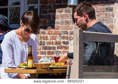 Tourists Couple Enjoy Their Meal