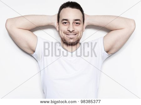 A relax man over a studio white background