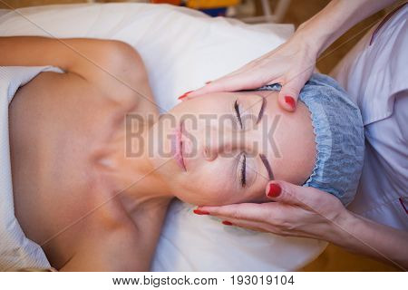 Cosmetology Doctor Makes Woman Treatments Facial Massage 1
