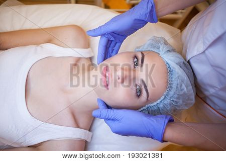 Cosmetology Doctor Makes Woman Treatments Facial Massage 1