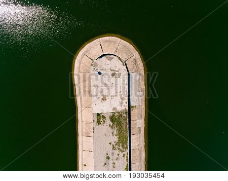 Aerial view breakwater at sea, cutwater, pier, groyne mole
