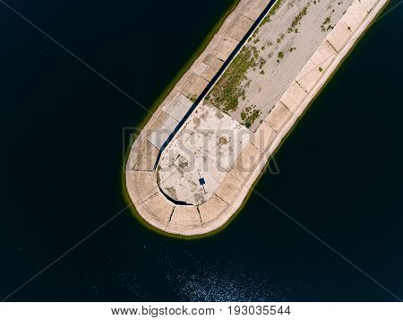 Aerial view breakwater at sea, cutwater, pier, groyne mole