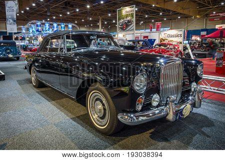 MAASTRICHT NETHERLANDS - JANUARY 14 2016: High-performance luxury car Bentley Continental S2 Drophead Coupe by Park Ward 1963. International Exhibition InterClassics & Topmobiel 2016