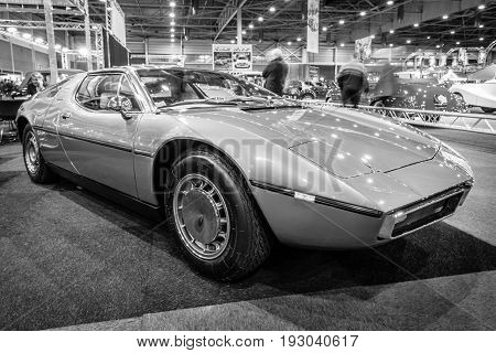 MAASTRICHT NETHERLANDS - JANUARY 15 2016: Mid-engined two-seat coupe Maserati Bora 1973. Black and white. International Exhibition InterClassics & Topmobiel 2016