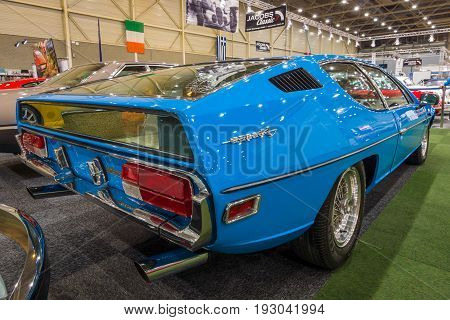 MAASTRICHT NETHERLANDS - JANUARY 15 2016: Grand tourer coupe Lamborghini Espada Series II 1972. Rear view. International Exhibition InterClassics & Topmobiel 2016