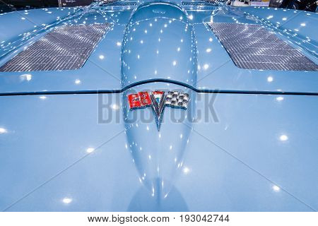 MAASTRICHT NETHERLANDS - JANUARY 15 2016: Detail and emblem of the sports car Chevrolet Corvette C2 