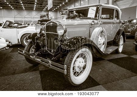 MAASTRICHT NETHERLANDS - JANUARY 15 2016: Vintage car Ford Model A A400 convertible 1931. Sepia. International Exhibition InterClassics & Topmobiel 2016