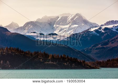 Alaska wilderness nature at dusk landscape scenery from cruise ship vacation in inside passage, tourist attraction, USA travel, United States of America.