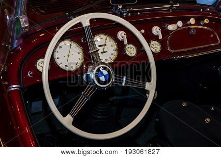 MAASTRICHT NETHERLANDS - JANUARY 15 2016: Cabin of a vintage car BMW 328 Roadster 1936. International Exhibition InterClassics & Topmobiel 2016