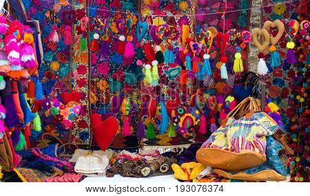 OAXACA MEXICO - MARCH 4: Colorful souvenirs for sale in a market in Oaxaca Mexico on March 4 2017