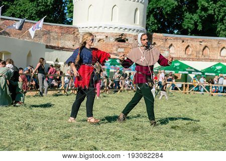 TROSTYANETS, UKRAINE - JUNE 25, 2017: Old Castle fest in action. Knights fight just beginning. This is 8 time traditional fest with historical costumes, foods and fights.