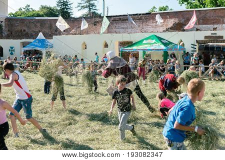 TROSTYANETS, UKRAINE - JUNE 25, 2017: Old Castle fest in action. Knights fight just beginning. This is 8 time traditional fest with historical costumes, foods and fights.