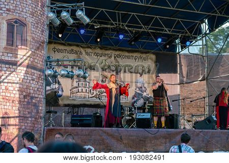 TROSTYANETS, UKRAINE - JUNE 25, 2017: Old Castle fest in action. Knights fight just beginning. This is 8 time traditional fest with historical costumes, foods and fights.