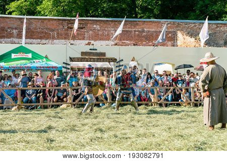 TROSTYANETS, UKRAINE - JUNE 25, 2017: Old Castle fest in action. Knights fight just beginning. This is 8 time traditional fest with historical costumes, foods and fights.